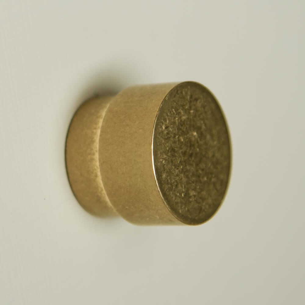 Aged-Brass-Drum-Cabinet-Knob-detail-of-texture