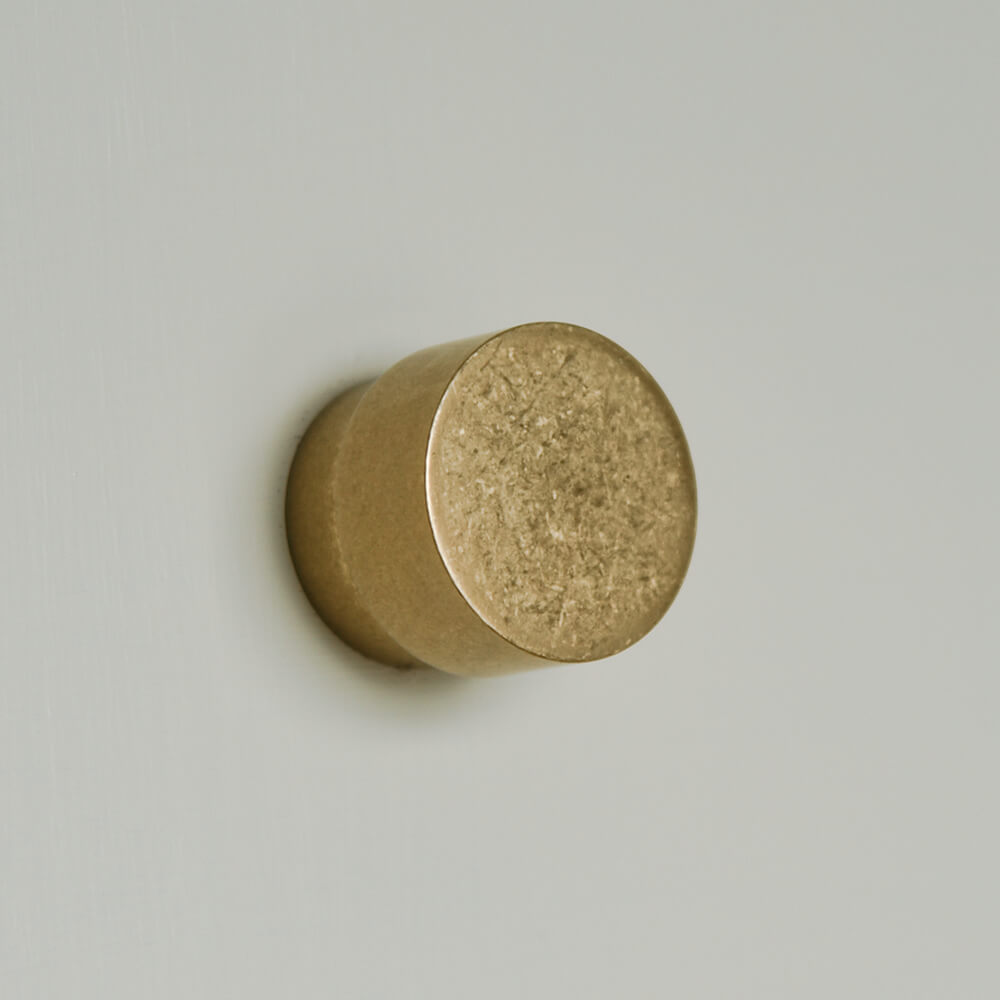 Aged-Brass-Drum-Cabinet-Knob.jpg from the front