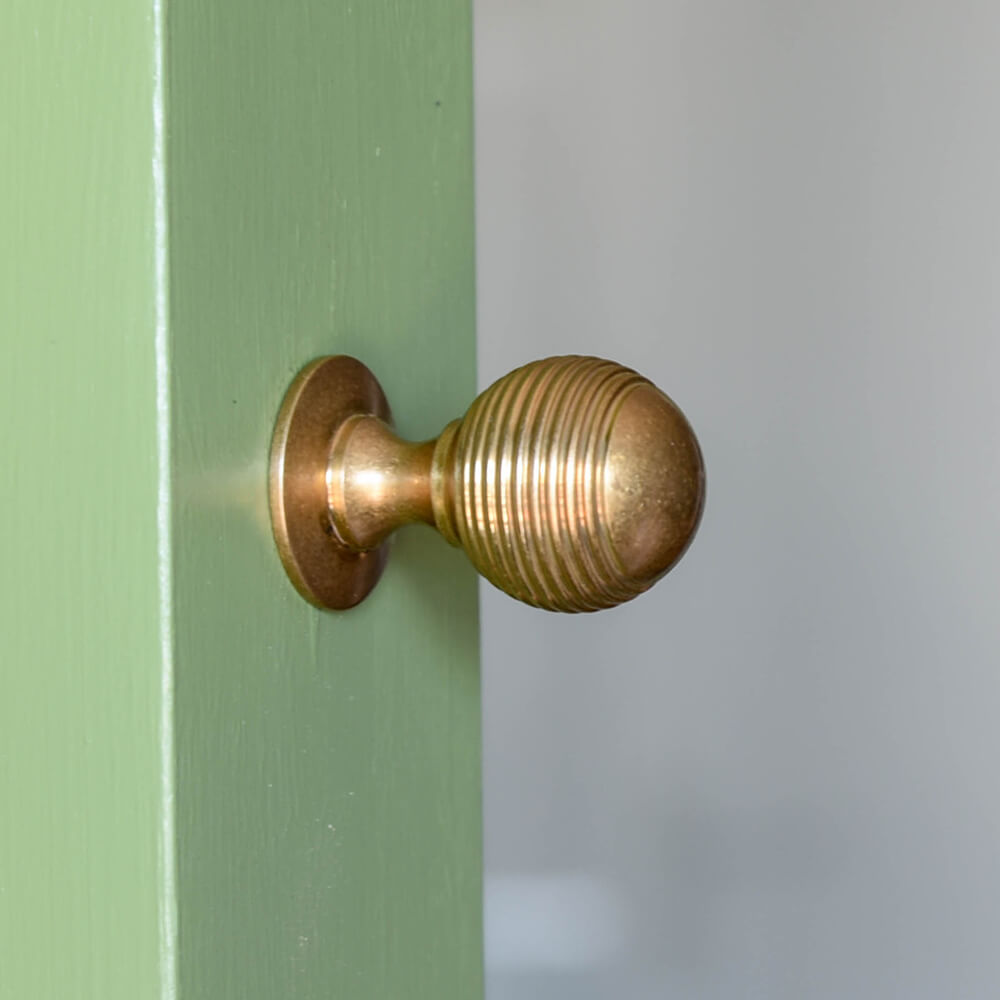 Elongated Aged Brass Reeded Beehive Cabinet Knob