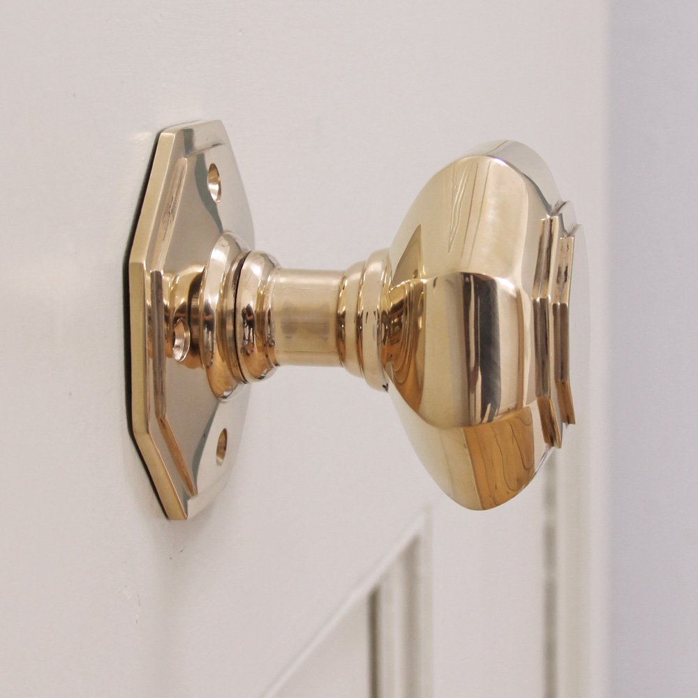 Brass octagonal door knob side view