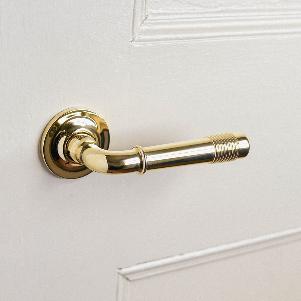 Solid brass door handles Lever handles on rose Reeded