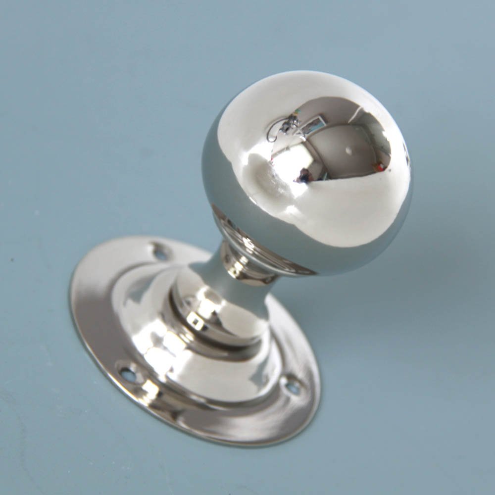 Round door knobs in polished nickel