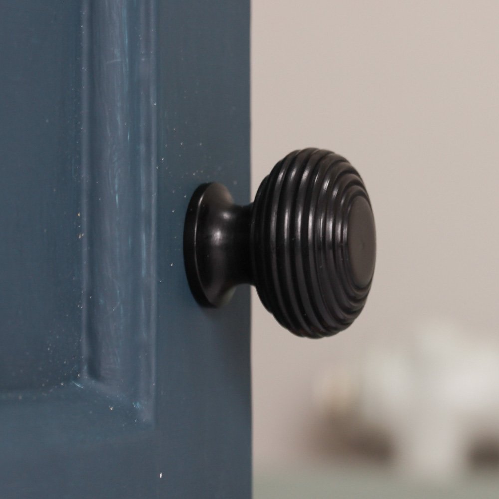 Solid ebony beehive cabinet knob side view