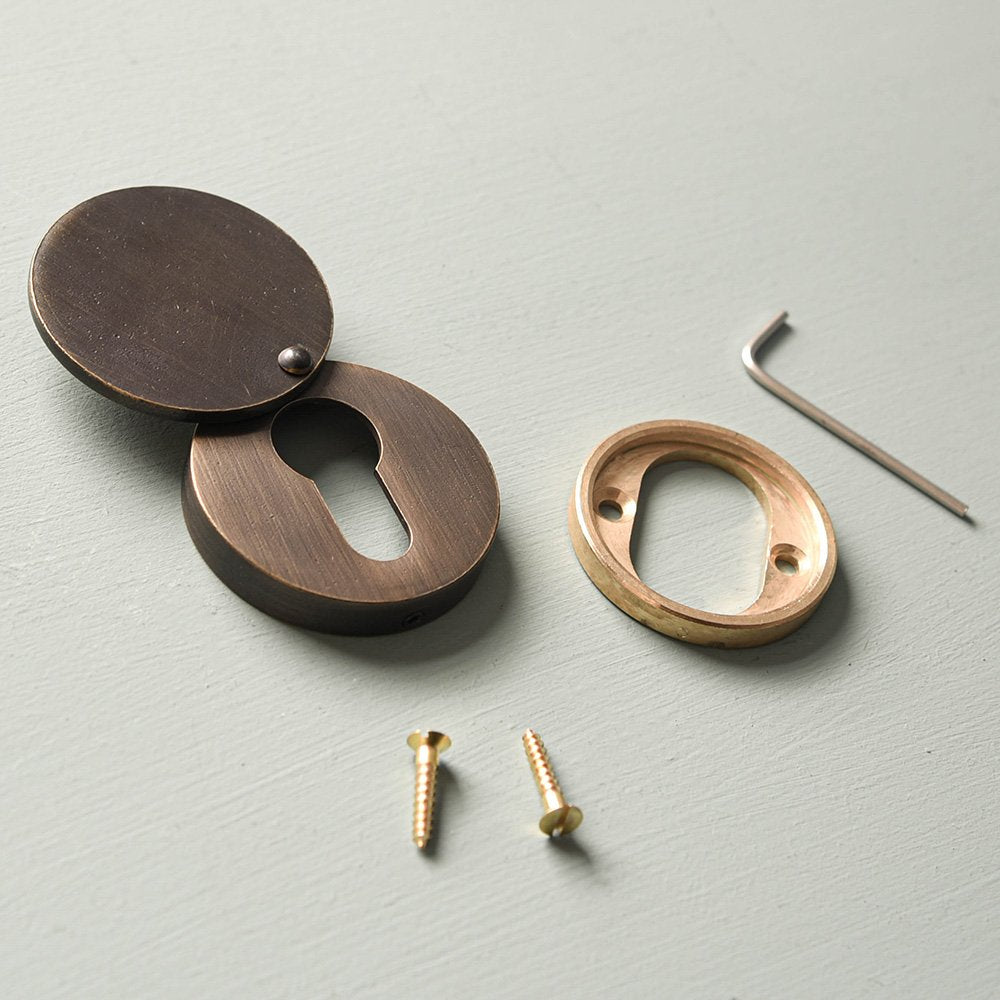 Components of Round Euro Escutcheon With Cover - Distressed Antique Brass.