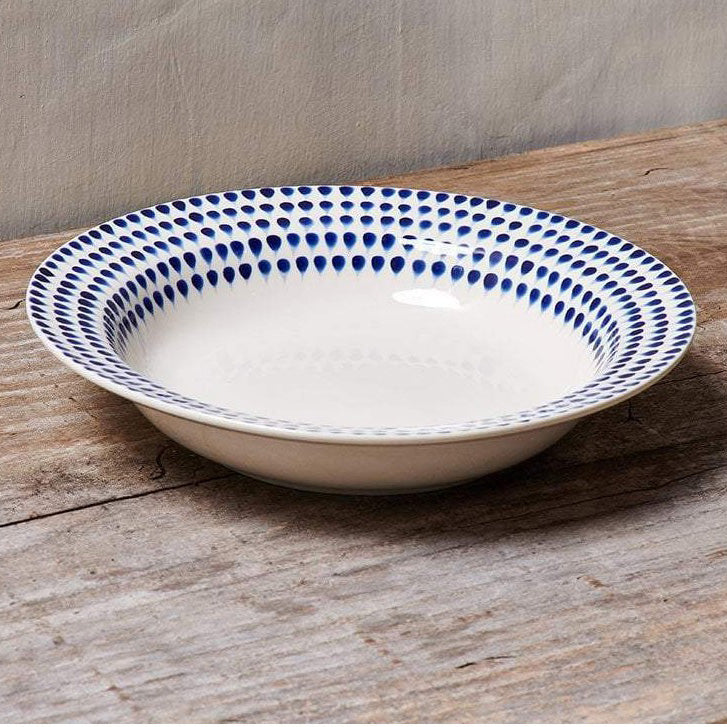 Pasta bowl with wide rim and blue tear drop design