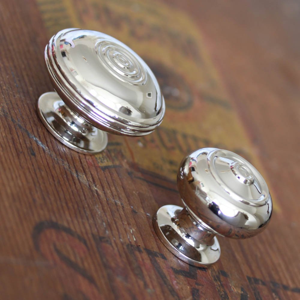 Small and large nickel regency bloxwich cabinet knobs