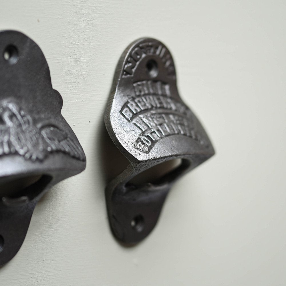 Detail of Cast Iron Wall Mounted Bottle Opener, with 'NOTTING HILL BREWERY' Text