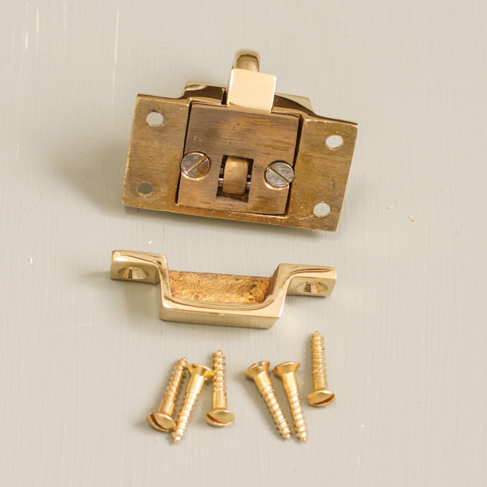 Components of solid brass Ring Catch.