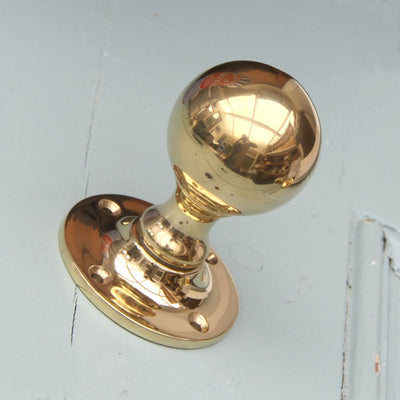 Polished Brass Round Door Knobs.