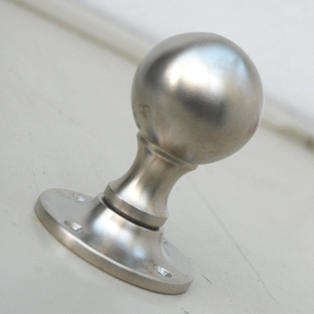 Solid brass Round Door Knobs with plated Satin Nickel finish.