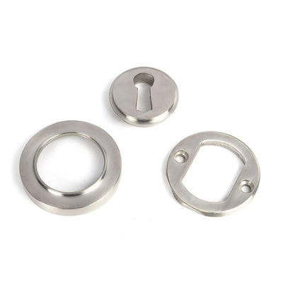 Satin Stainless Steel Concealed Round Escutcheon deconstructed to show parts