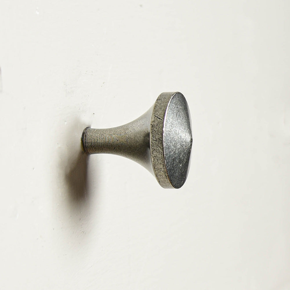A Shropshire cabinet knob fitted showing the pewter patina finish