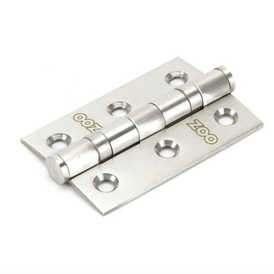 A ball bearing butt hinge in stainless steel laid flat