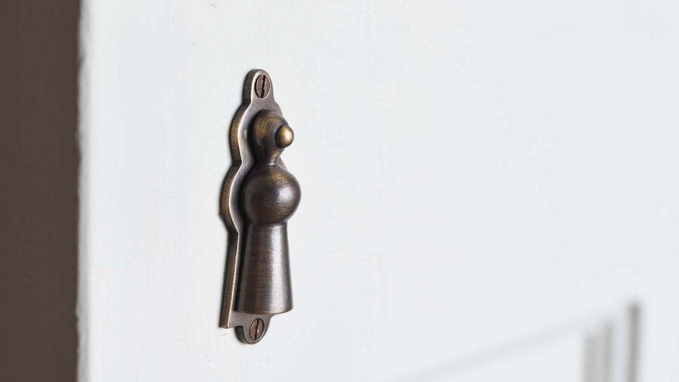 Brass Escutcheon keyhole cover on door
