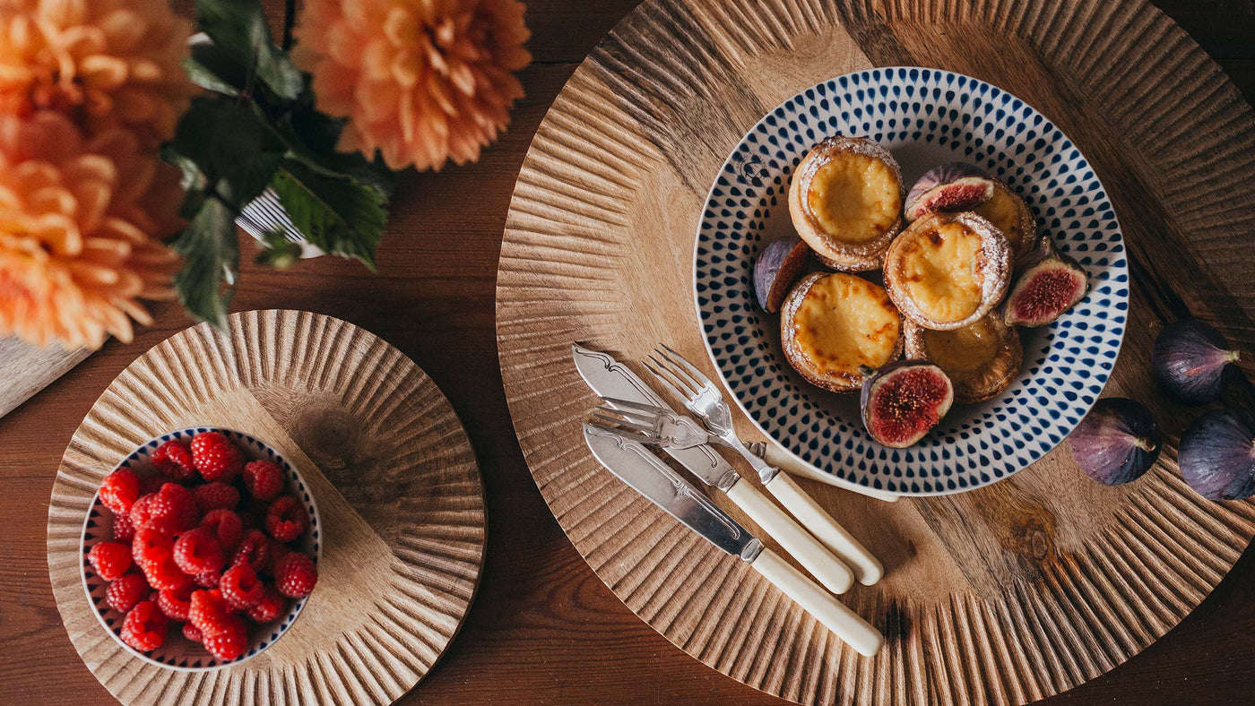 Serving Boards on a table with dinnerware