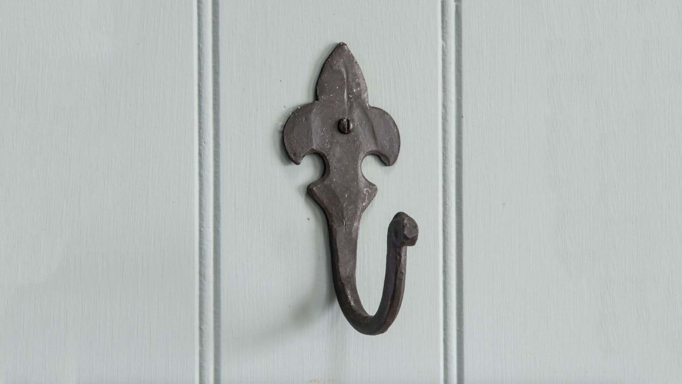 Wrought Iron Beeswax Hook in a traditional Fleur de Lys design
