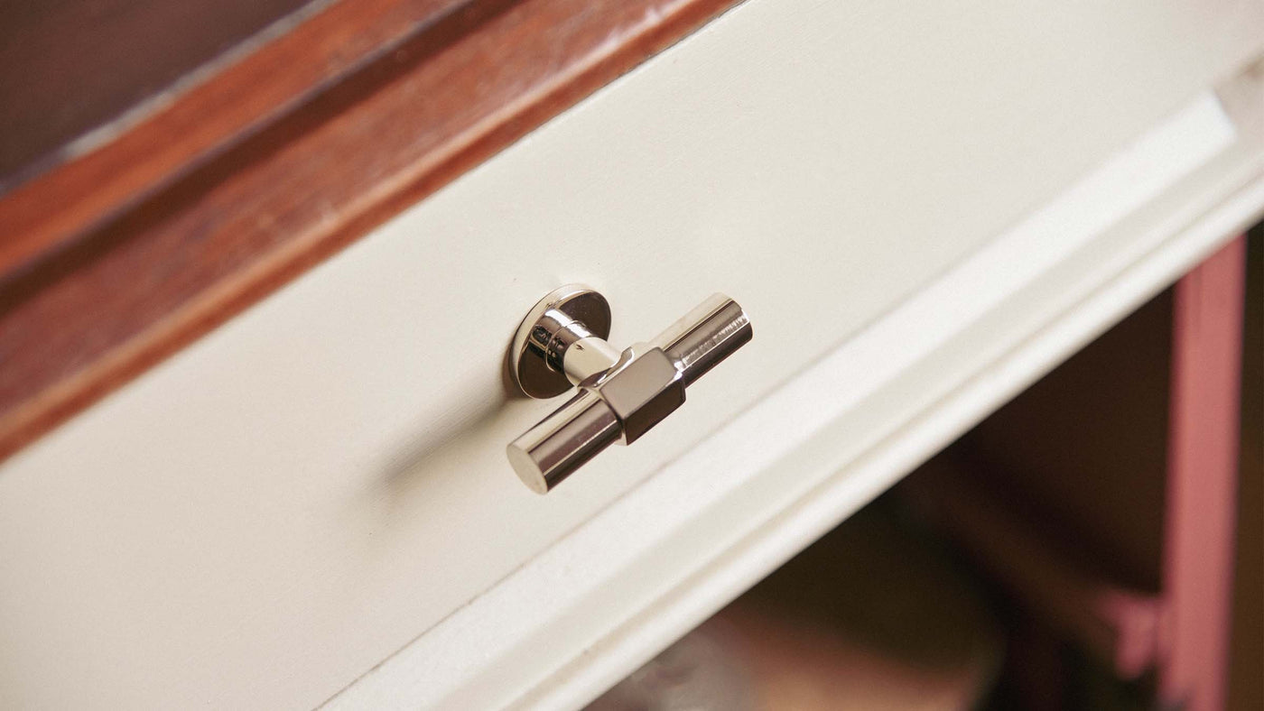 Cabinet Knobs on Wooden Cabinet Drawers