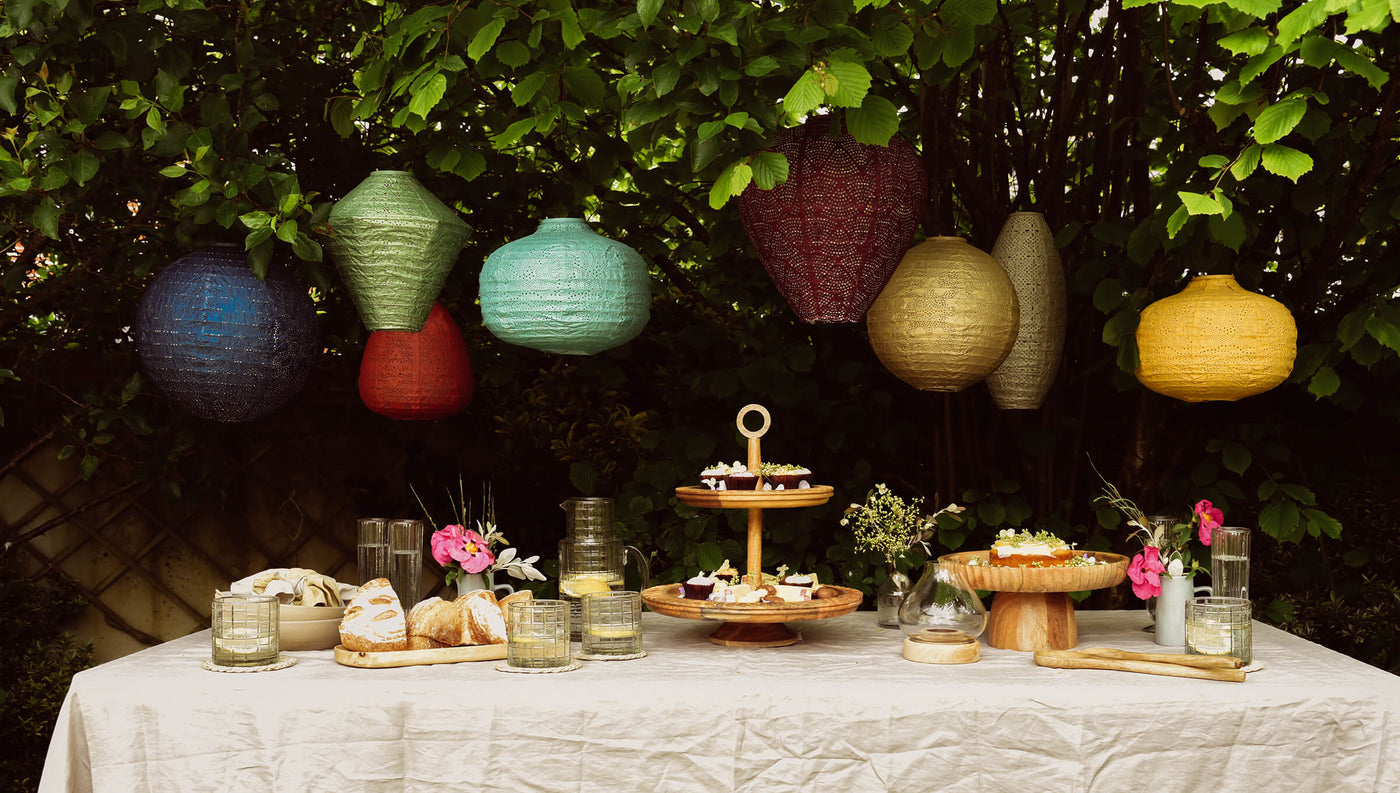lanterns and summer garden table set for a party