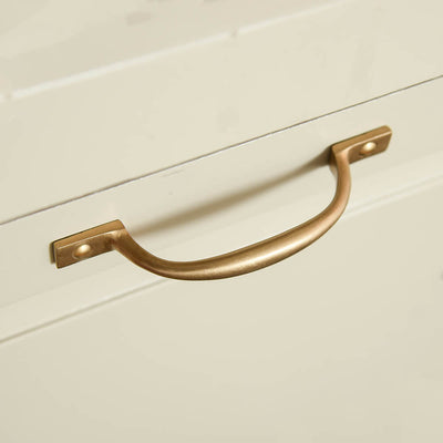 D shaped pull handle on off white drawer