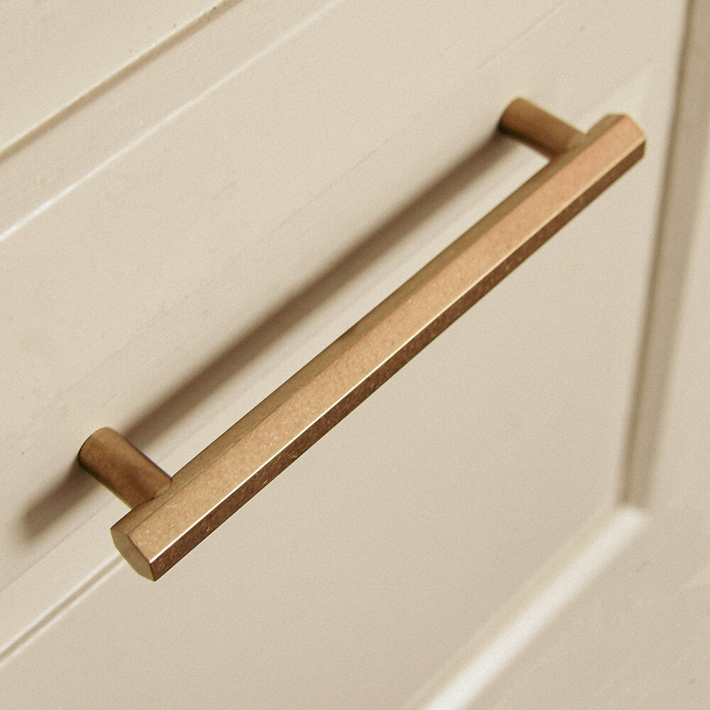Hexagonal Long brass pull handle with an aged finish