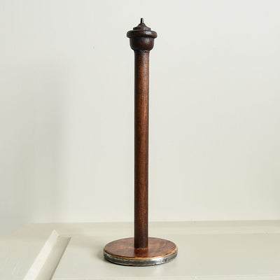 Wooden kitchen roll holder made from an original antique textile bobbin.