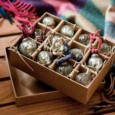 mini baubles in a brown box for storage