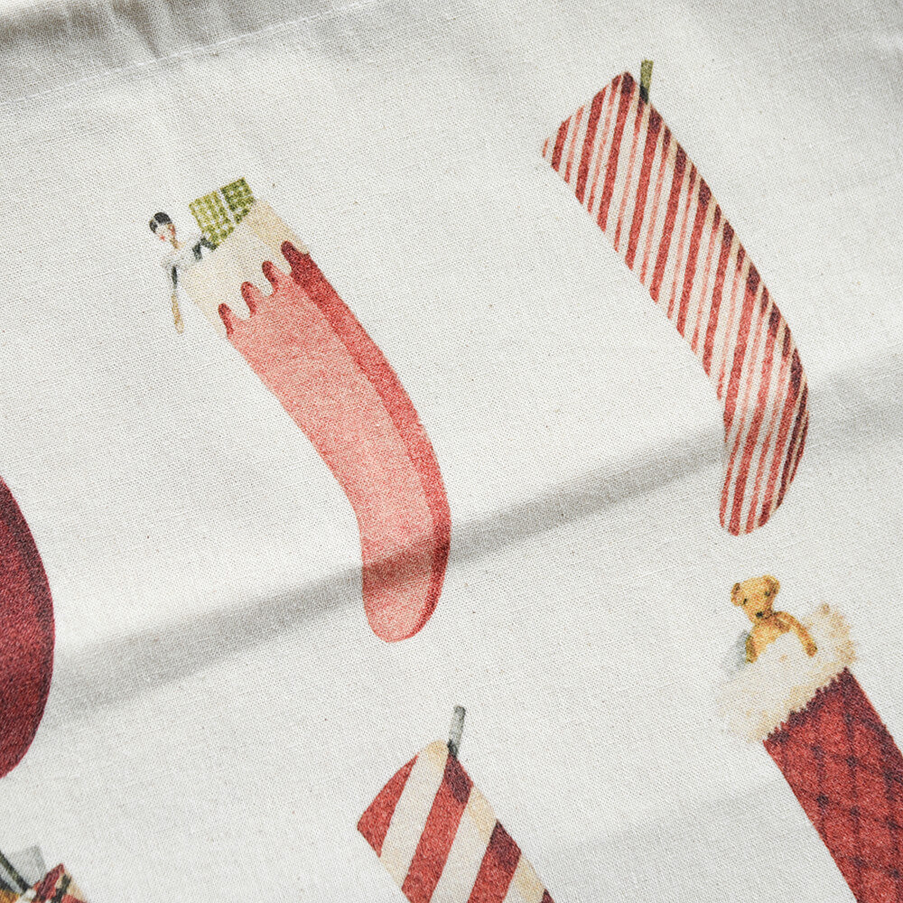 Pattern of Christmas stockings with candy canes and teddy bears on a white background