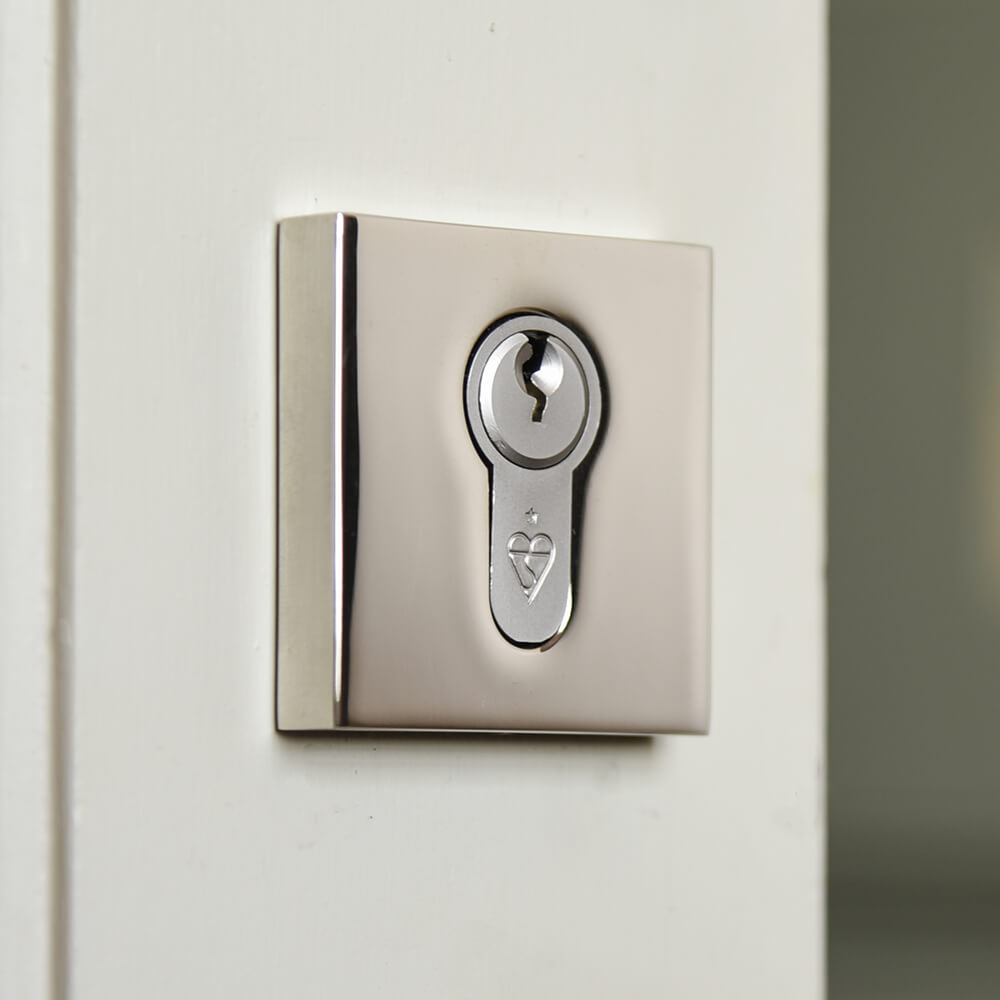 Polished Nickel Concealed Square Euro Escutcheon seen on a door with lock installed