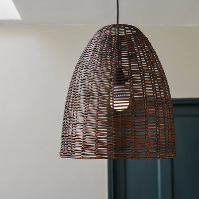 dark rattan shade in room with bulb
