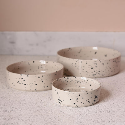 3 sizes of ceramic et bowls with black splatter design