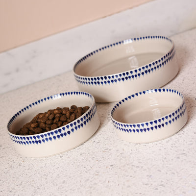 Indigo Drop Ceramic Pet Bowls with food and water