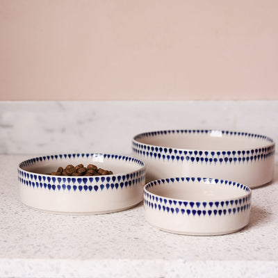 Indigo Drop Ceramic Pet Bowls shown in three sizes