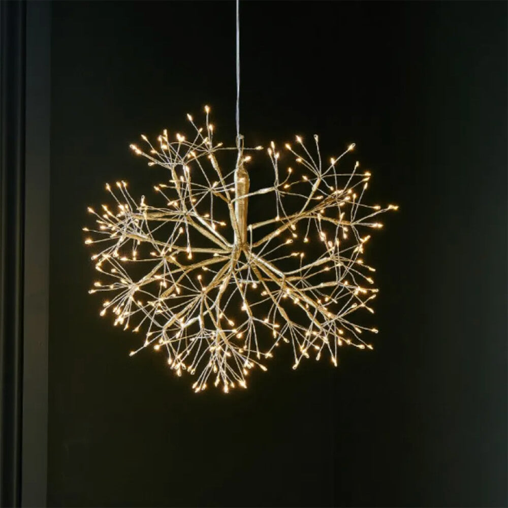 Chandelier with starburst design on a black background