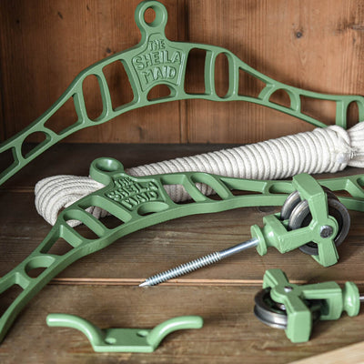 Parts of a sheila maid shown in sage green and including rope and iron fixings