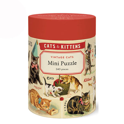 Cylindrical puzzle box with vintage cat illustrations and a red lid.