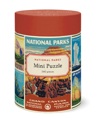 A packaged mini jigsaw puzzle with a National Parks theme, containing 240 pieces, displayed in a cylindrical container with illustrations of various national parks.