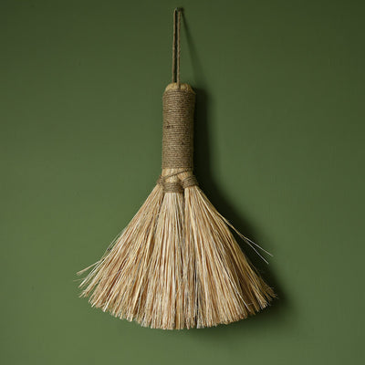 brush in a fan shaped with natural bristles on a green wall