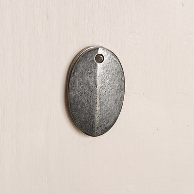 Pewter coloured over escutcheon with covered and aged texture