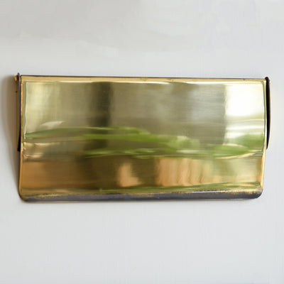 Gold rectangular letter tidy cover on a white background