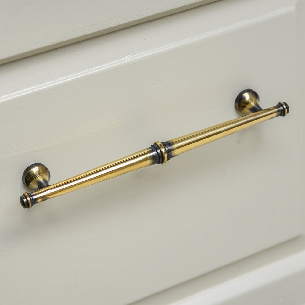 Polished Antique Brass Regency Pull Handle with tapered end and reeded detailing to the central piece