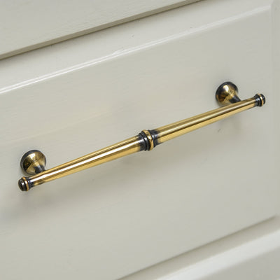 Polished Antique Brass Regency Pull Handle with tapered end and reeded detailing to the central piece