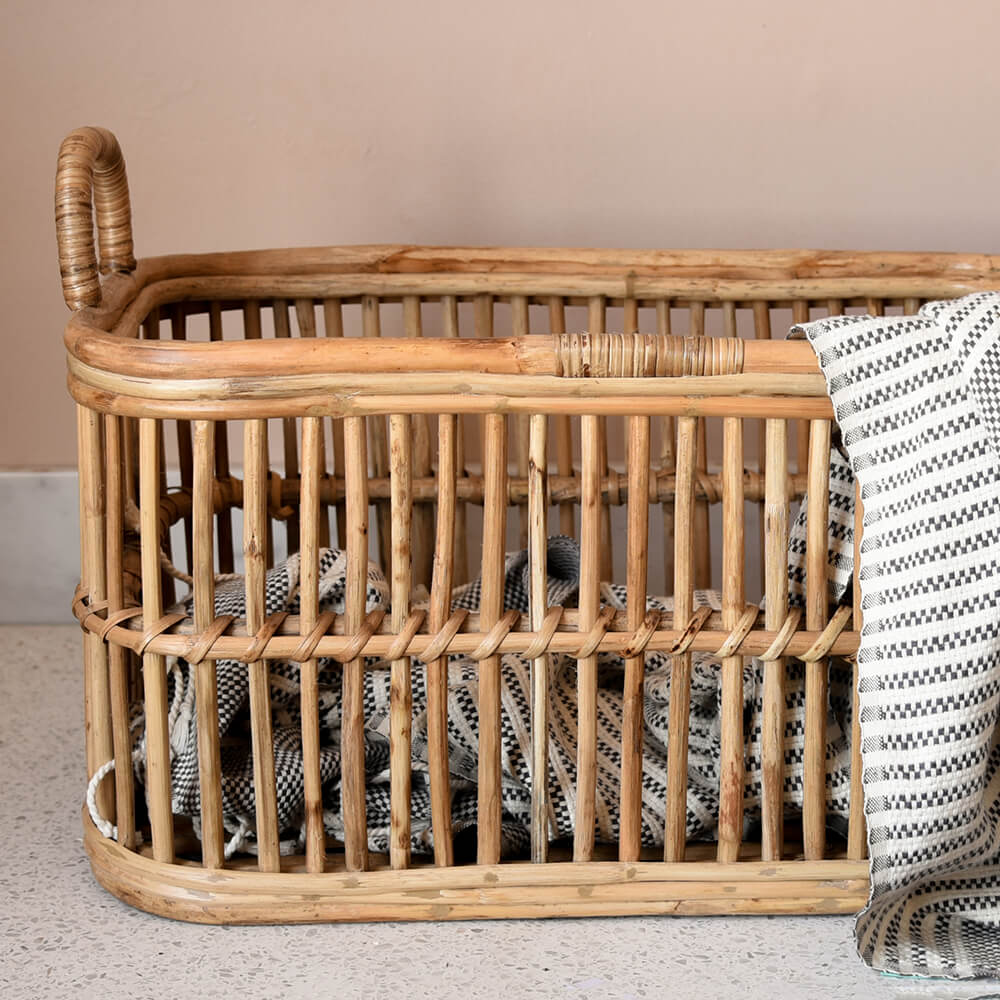 Laundry basket with blanket showing detail