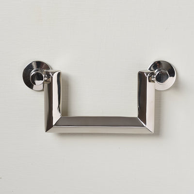 Nickel silver coloured drawer pull with a very angular form