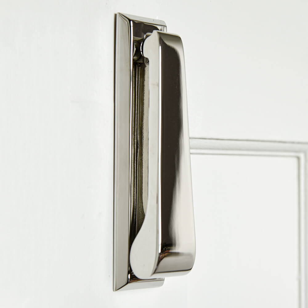 Simple nickel upright door knocker