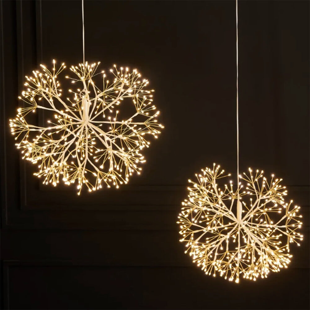 Two spherical LED string lights hanging against a dark background
