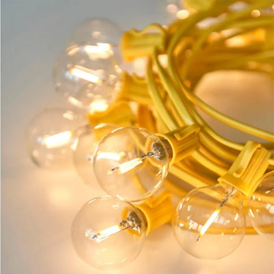 Detail showing a coil of Yellow Festoon Lights - String of 15