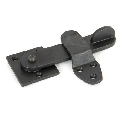 black beeswax latch with square backplate against white background