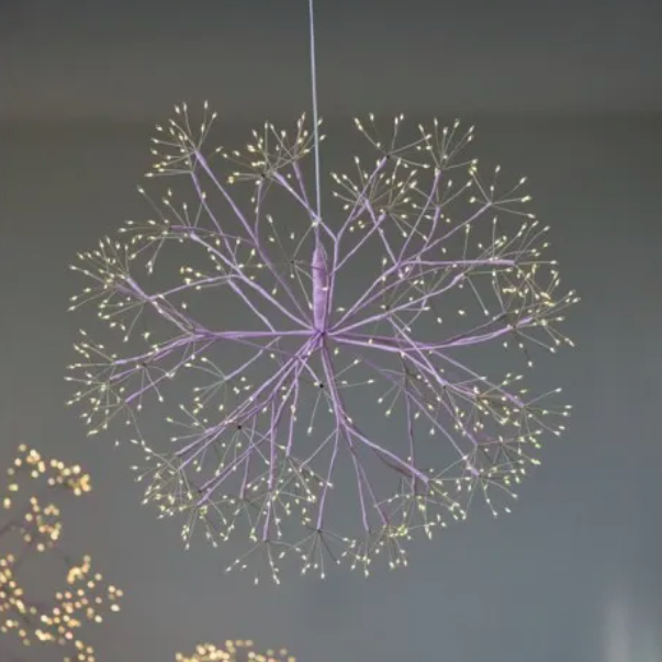 A purple hanging dandelion light fixture with LED lights designed to resemble seeds or petals radiating from the center.