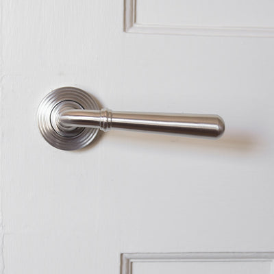 satin stainless steel lever door handle showing matt silver colour