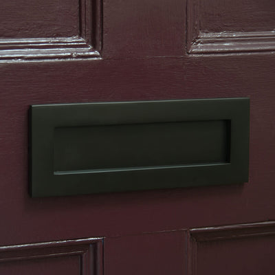 Aged Bronze letterplate maroon front door